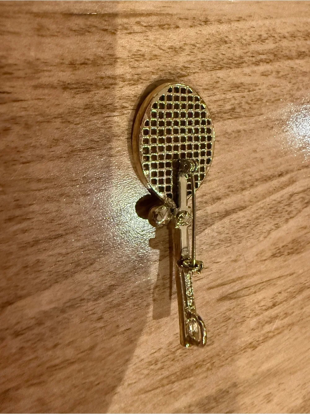 Gold Tennis Racket Brooch with Red and White Handle